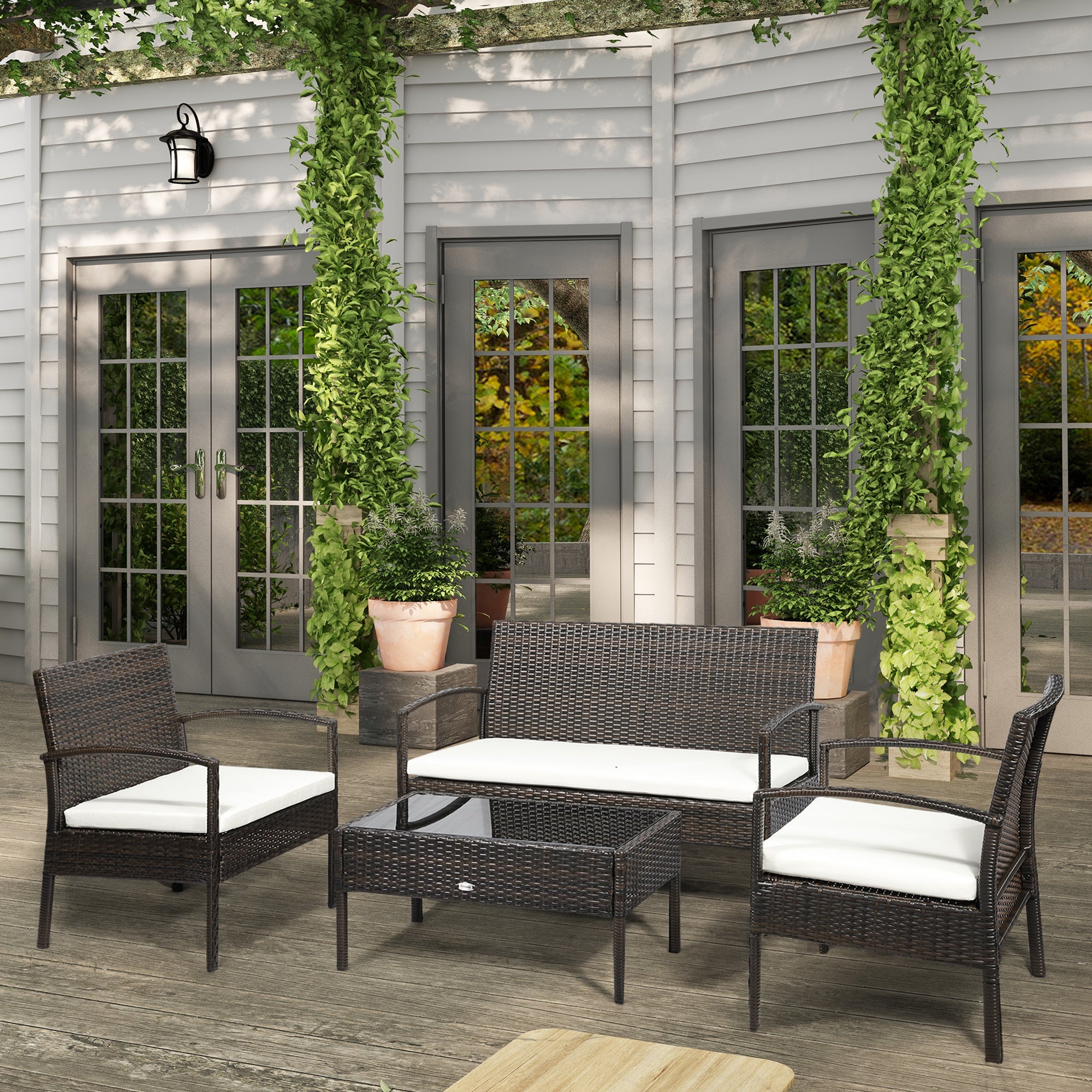 4-Piece PE Rattan Outdoor Furniture Set with Cushions & Coffee Table