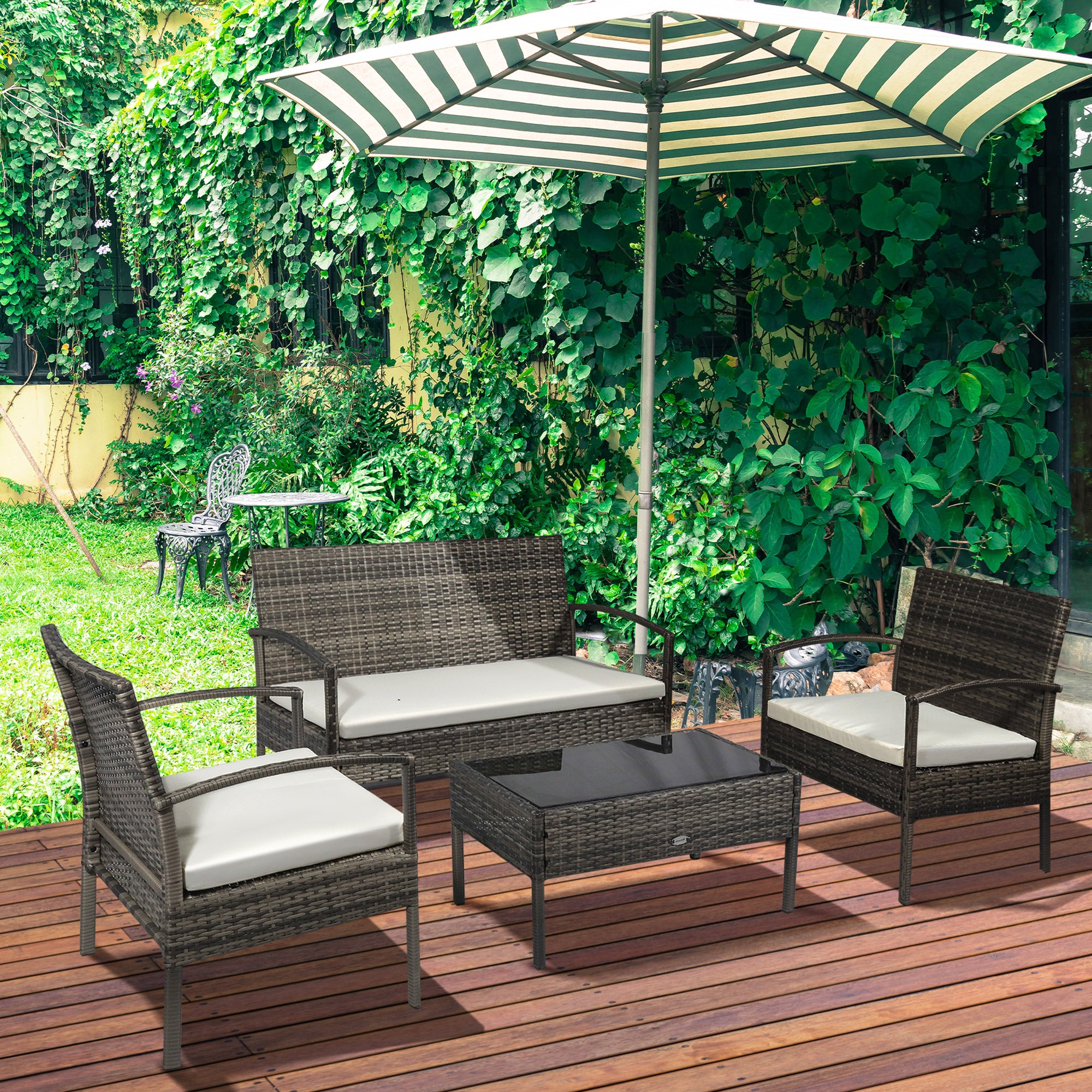 4-Piece PE Rattan Outdoor Furniture Set with Cushions & Coffee Table